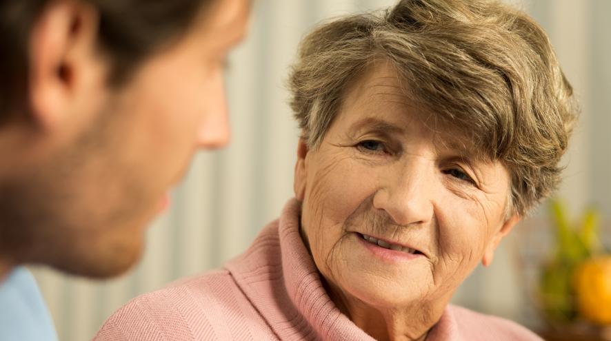 Senior woman talking with her doctor.