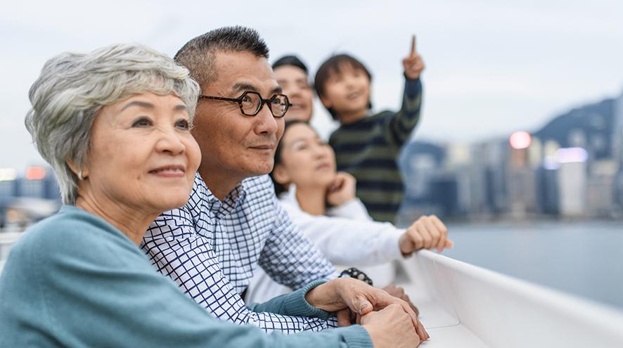 Family enjoying views of the oceanside horizon.