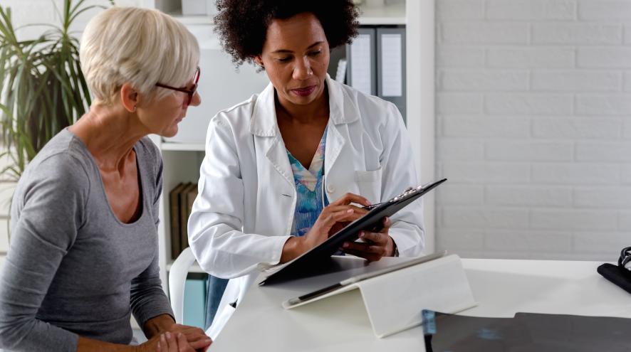 A doctor explaining something to a patient