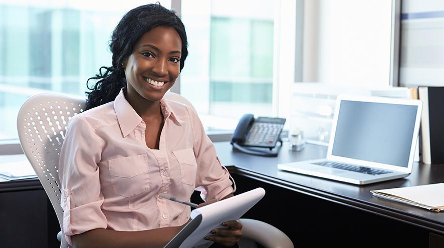 Young woman working in office.