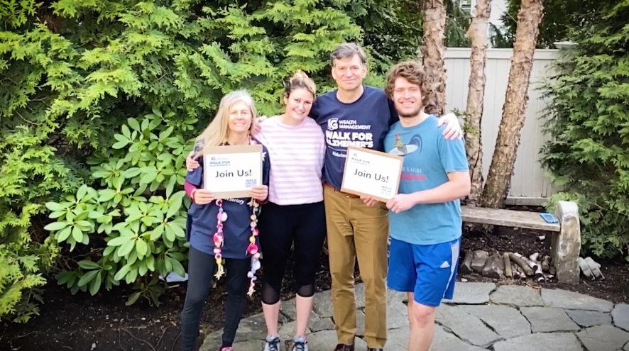 Jeff Carney, former CEO of IG Wealth Management, and his family standing outside, smiling in support of the IG Wealth Management Walk for Alzheimer's.