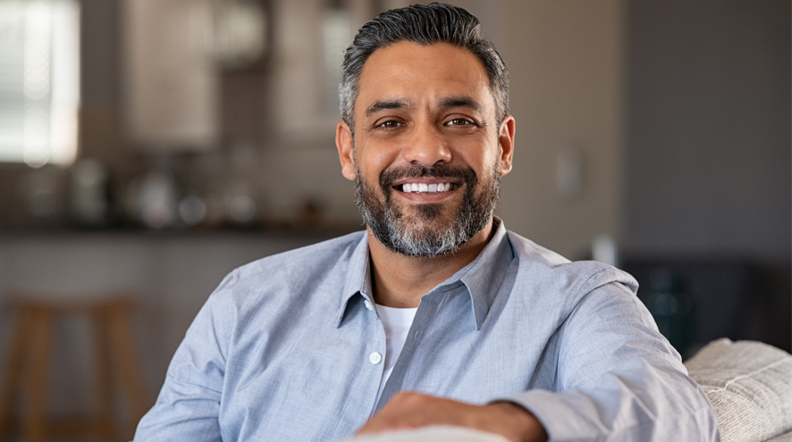 Midlife man smiling at camera