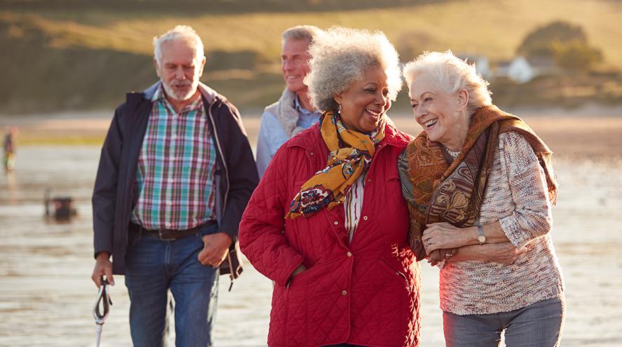 Group of senior friends enjoying a walk together.