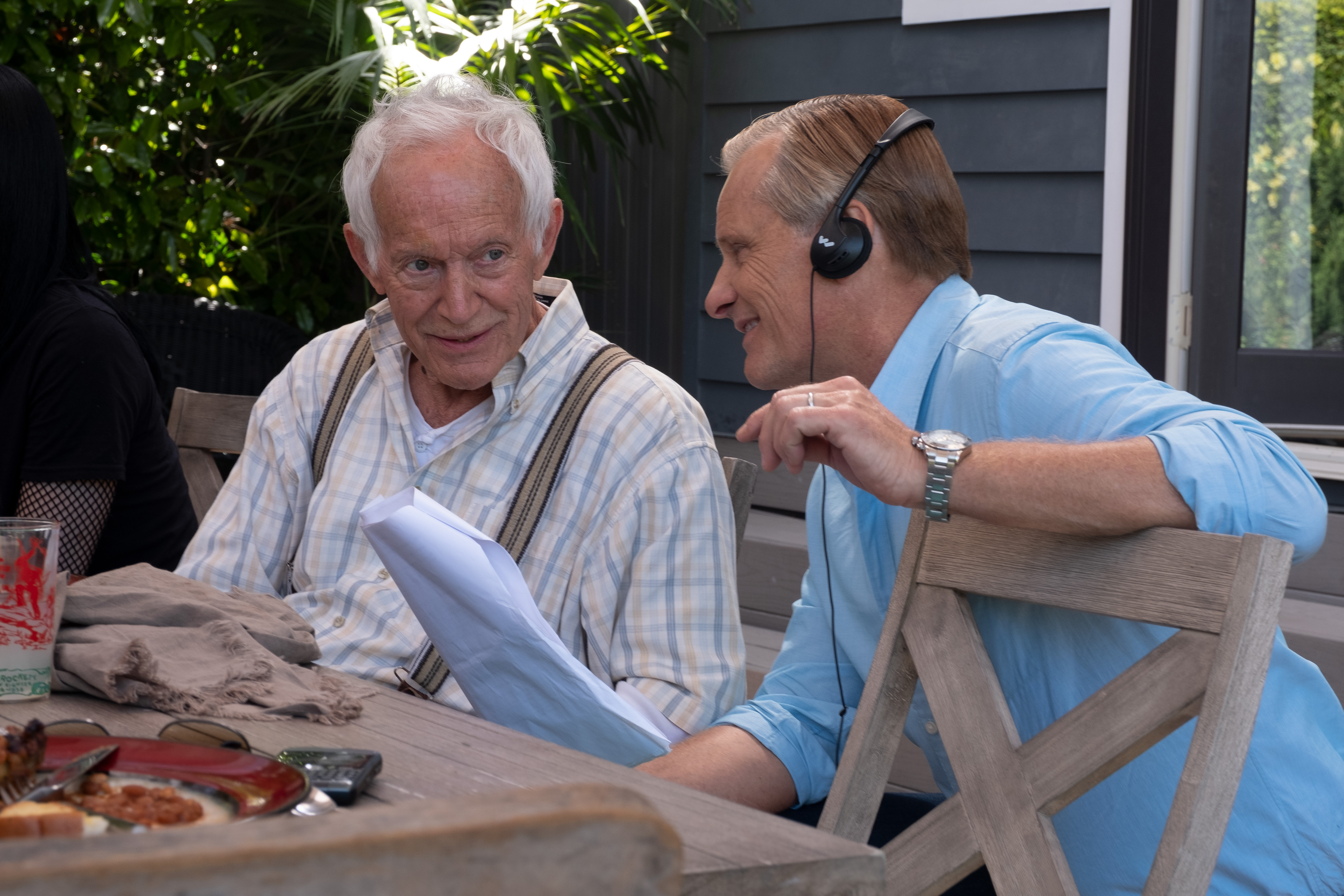 Viggo Mortensen and Lance Henriksen discussing a scene in 'Falling'.