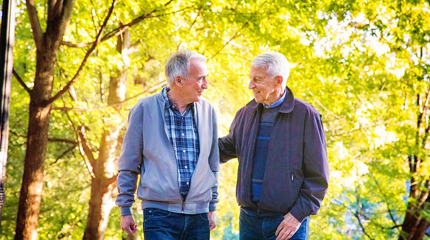 Senior couple on a walk in the forest.