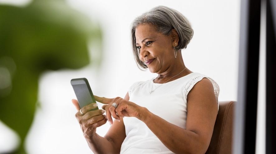 Senior woman using her phone.